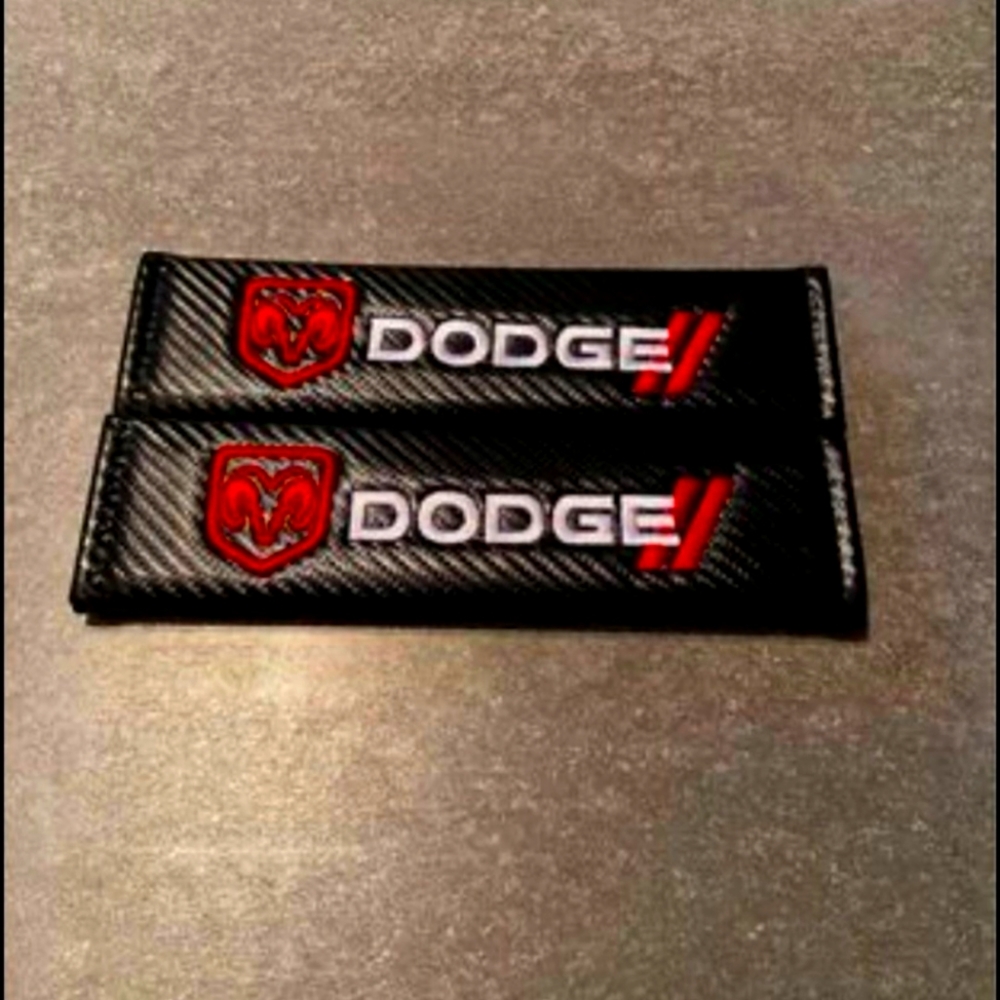 2 Dodge car seat belt pads covers.  PLEASE ASK IF IN STOCK
